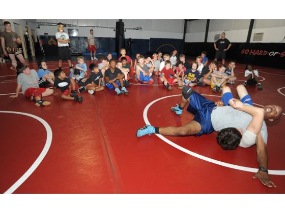 Wrestling club pairs technique with social, leadership skills 