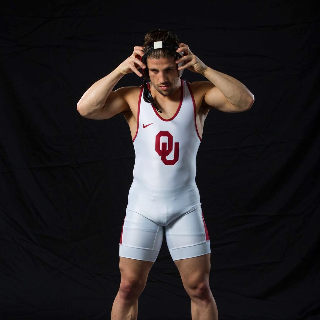 OU Wrestler putting on headgear