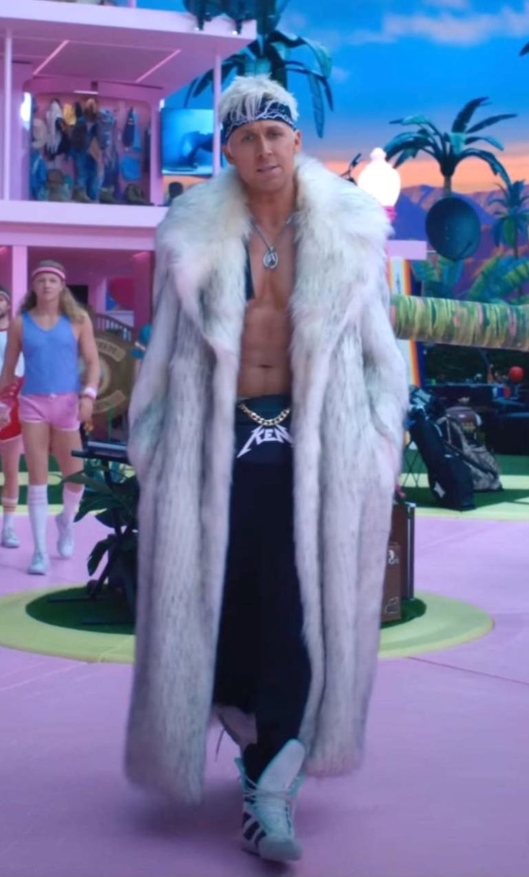 Ryan Gosling in the Barbie movie in a fur coat and boxing boots.